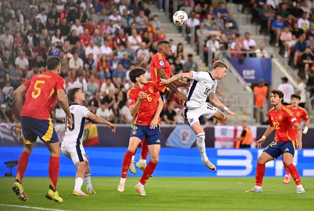 Jay Stansfield of England battles for possession with Cristhian Mosquera and Javi Guerra of Spain