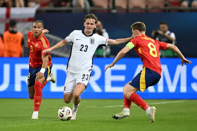 Tyler Morton of England is challenged by Mateo Joseph and Benat Turrientes of Spain