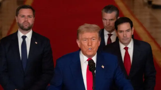 US President Donald Trump (centre) delivers an address to the nation, flanked by (from left to right) Vice-President JD Vance, Secretary of Defence Pete Hegseth, and Secretary of State Marco Rubio. Photo: 21 June 2025