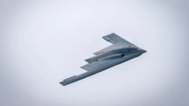 U.S. Air Force B-2 Spirit bomber, assigned to the 509th Bomb Wing out of Whiteman Air Force Base, Missouri, performs a fly-over