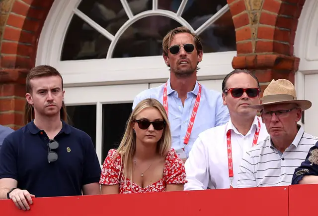Peter Crouch watching tennis at Queen's