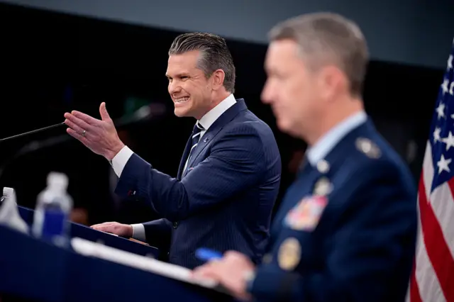 Pete Hegseth (left) and Gen Dan Caine earlier
