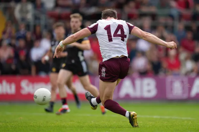 Shane Walsh scoring a goal against Down