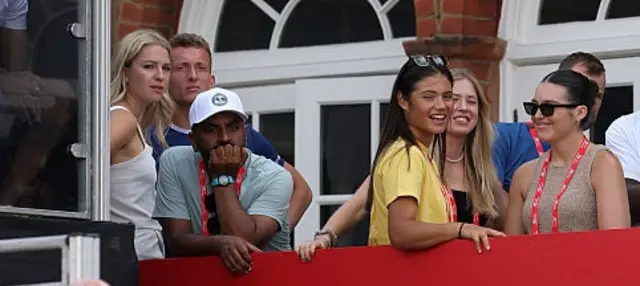 Jiri Lehecka and Emma Raducanu are among a group of spectators watching tennis at Queen's