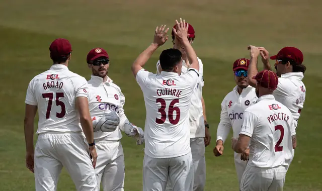 Liam Guthrie of Northamptonshire Steelbacks celebrates after taking the wicket of Max Holden of Middlesex