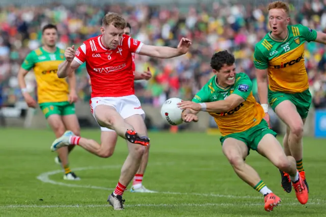 Donegal's Finnbarr Roarty makes a superb block to deny Louth's Peter Lynch