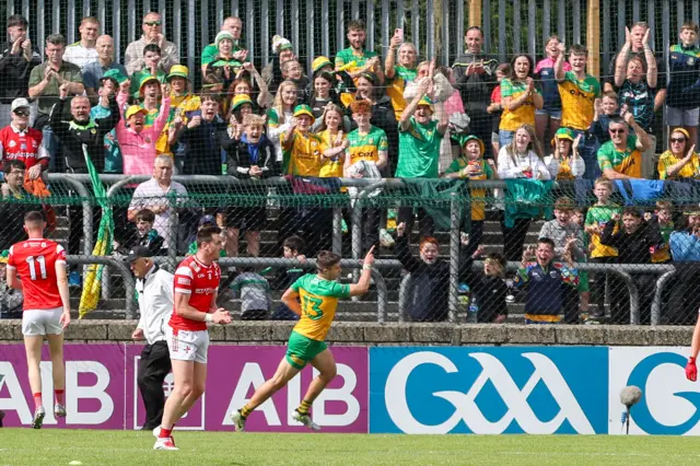 Conor O'Donnell celebrates in front of Donegal fans