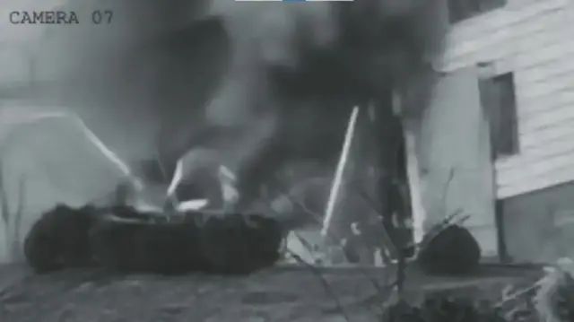 A black and white photo appearing to show an explosion