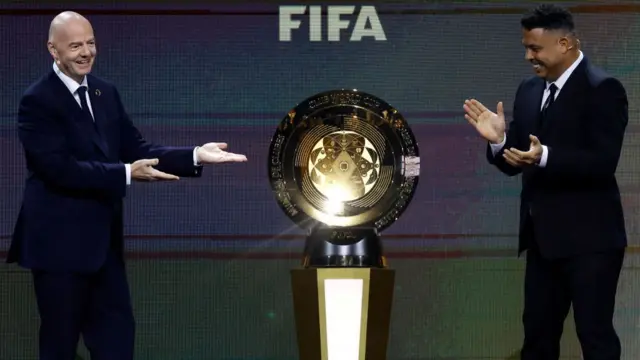FIFA President Gianni Infantino presents The FIFA Club World Cup Trophy with Ronaldo