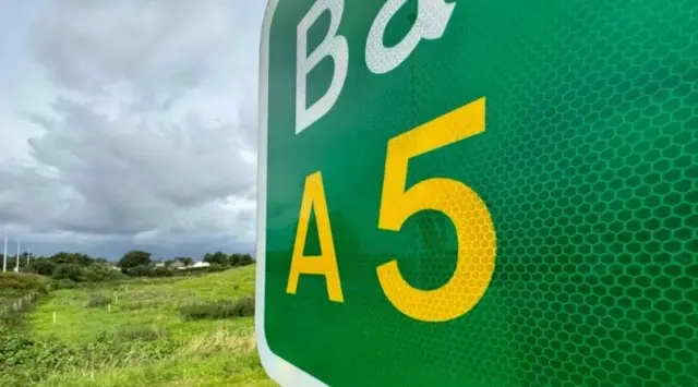 A5 road sign with field in the background