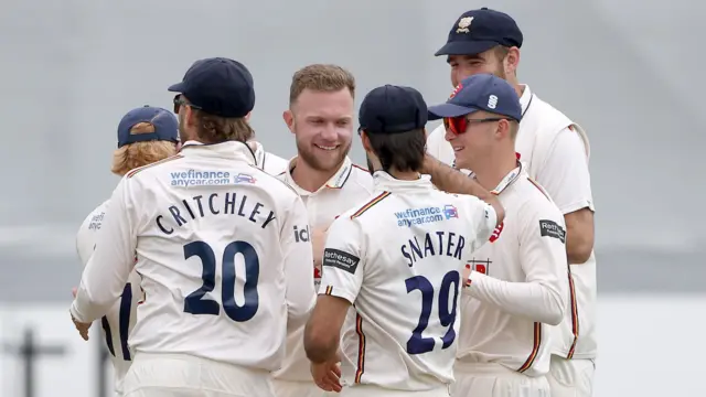 Sam Cook of Essex celebrates