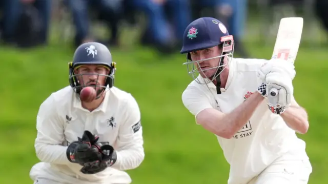 Ashton Turner strikes a boundary for Lancashire against Kent