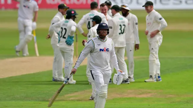 Jonny Bairstow walks off