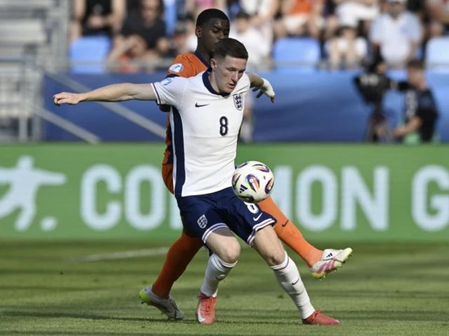 England's Elliot Anderson in action with Netherlands' Jorrel Hato