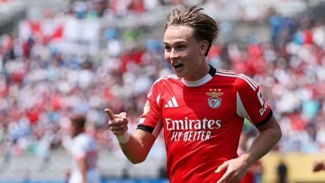Andreas Schjelderup celebrates after scoring for Benfica against Bayern Munich