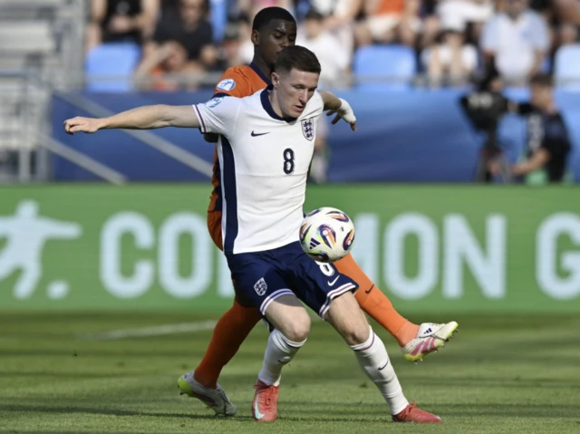 England's Elliot Anderson in action with Netherlands' Jorrel Hato