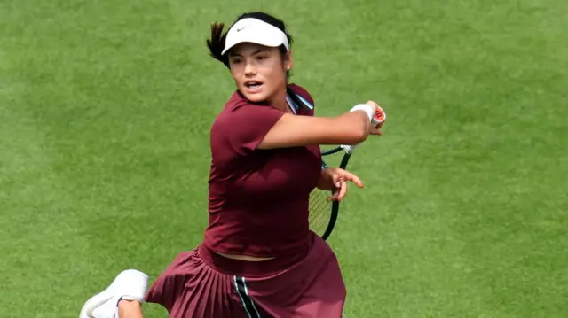 Emma Raducanu plays a shot