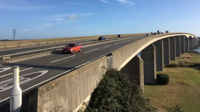 A drone image of the A14 over Orwell Bridge. Vehicles are seen moving along the road in each direction.