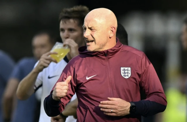 England manager Lee Carsley looks on