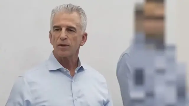The Israeli spy chief appeared in a rare video, with agents around him blurred out