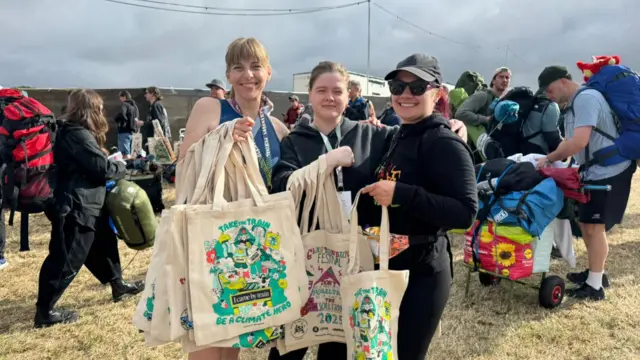 Marilyn Adams, 53, from Taunton, with Louisa Garbett, 33, from Shepton Mallet in Somerset and Charlotte Sweet, 30, from London. They are all volunteering for Kids with a Future, which helps homeless children in Somerset.