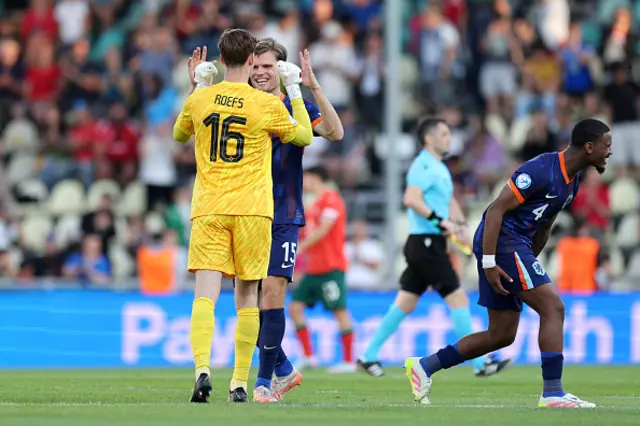Robin Roefs of the Netherlands celebrates victory with team mate Bjorn Meijer
