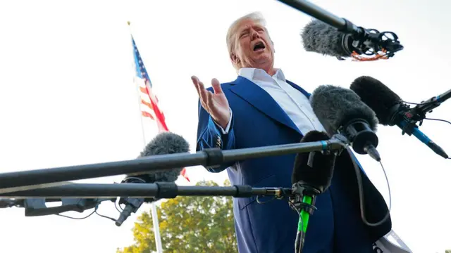 Donald Trump speaks to reporters before boarding the Marine One presidential helicopter and departing the White House on 24 June 2025 in Washington, DC.