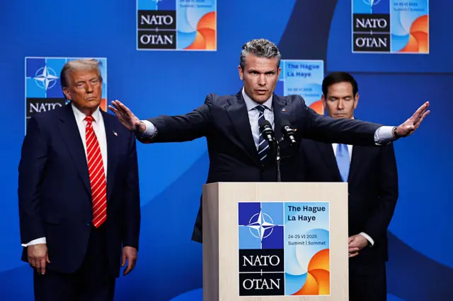 Pete Hegseth, US secretary of defense, center, during a news conference with US President Donald Trump, left, and Marco Rubio, US secretary of state,