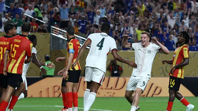 Tosin Adarabioyo celebrates a Chelsea goal with Liam Delap against ES Tunis