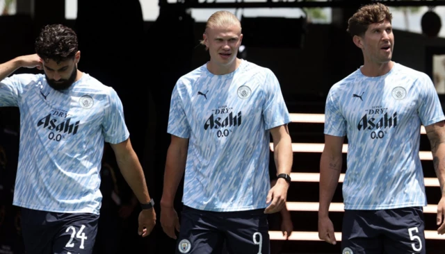 Manchester City's Josko Gvardiol, Manchester City's Erling Haaland and Manchester City's John Stones
