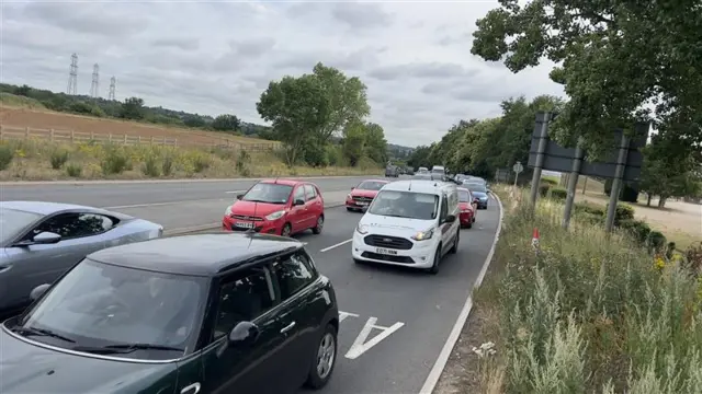 The side of the A137 as drivers queue to get on to the A14.
