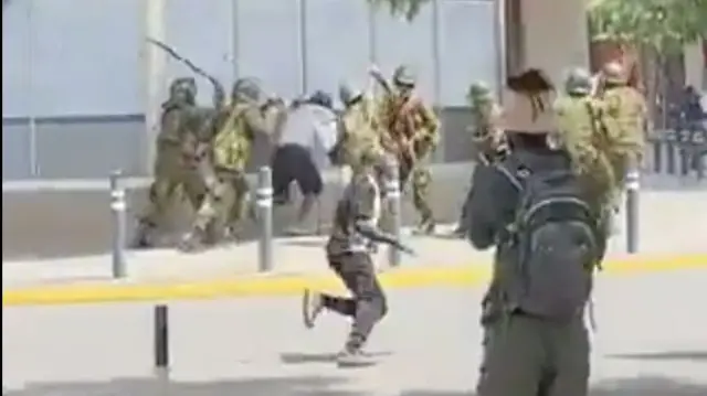 Screengrab of police and protestors clashing near City Hall in Nairobi