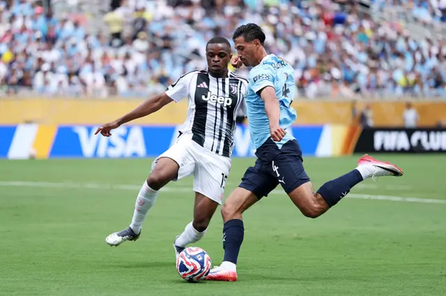 Tijjani Reijnders challenged by Pierre Kalulu