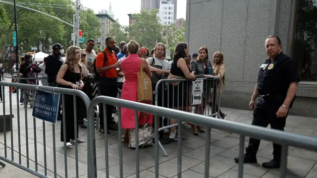Journalists wait to enter for the Sean Combs' sex trafficking and racketeering trial