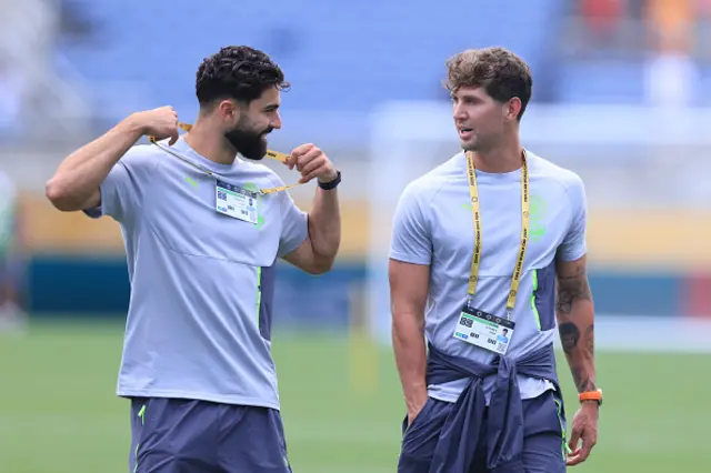Josko Gvardiol and John Stones of Manchester City look on