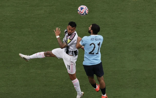 Juventus' Nicolas Gonzalez in action with Manchester City's Rayan Ait Nouri