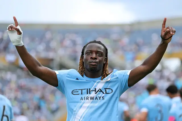 Jeremy Doku #11 of Manchester City celebrates