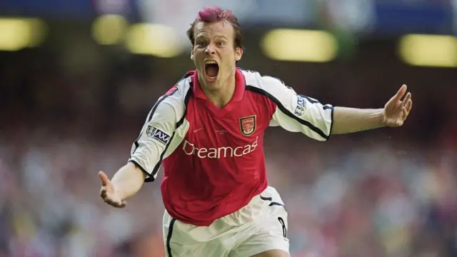 Fredrik Ljungberg of Arsenal celebrates scoring