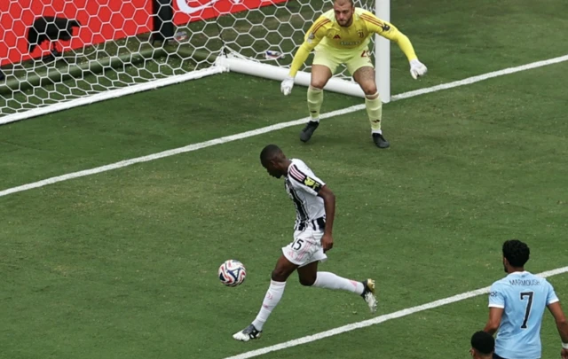 Juventus' Pierre Kalulu scores an own goal