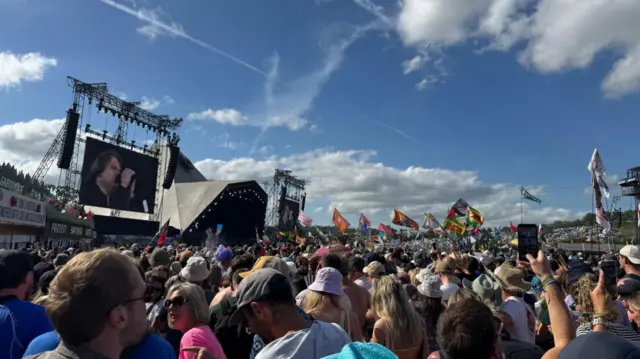 Glastonbury crowds watching Lewis Capaldi on stage