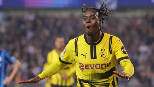 Jamie Gittens celebrates scoring for Borussia Dortmund against Club Brugge