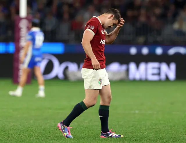 Tomos Williams walks off