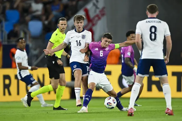 Hinshelwood and Hackney crowd out a Germany attack