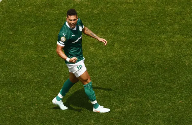 Palmeiras' Paulinho celebrates scoring the first goal