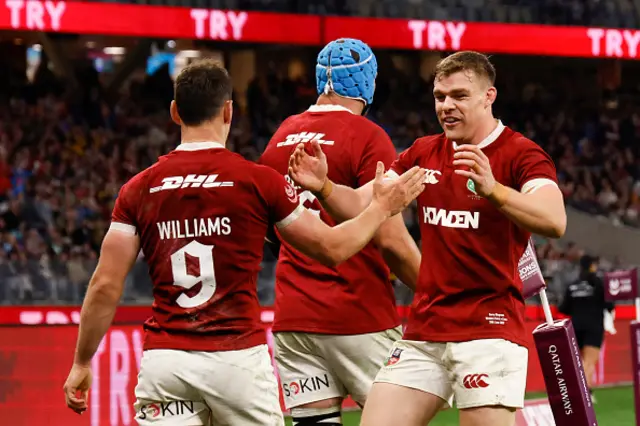 Tomos Williams celebrates