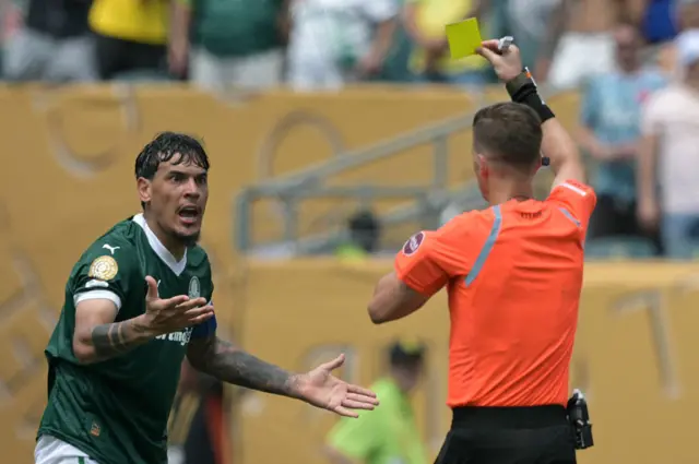 Gomez reacts after being shown a second yellow card
