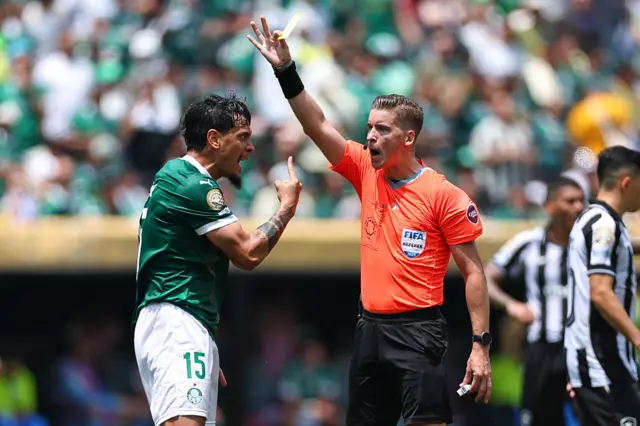 Gustavo Gomez is shown a yellow card
