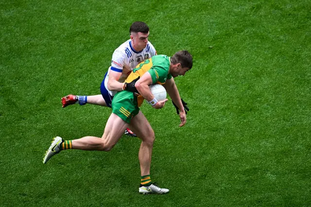 Conor O'Donnell of Donegal in action against Mícheal McCarville