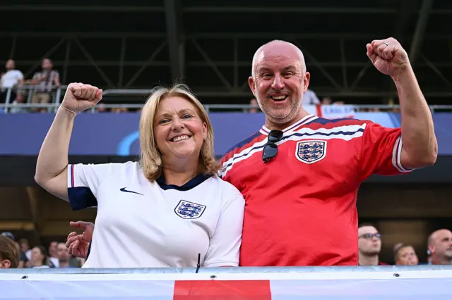 England fans smile and wave as they are photographed