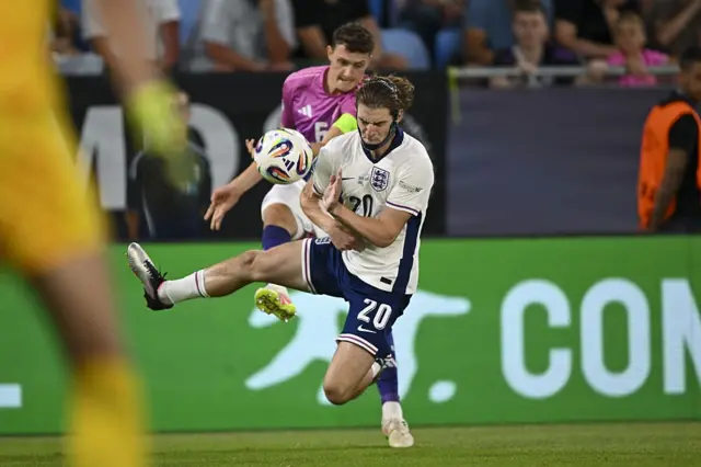 Scott is pressed by the German strikers